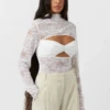 Angelo Lace Top White -Faithfull The Brand || Commando || Rebecca Vallance Shop C M CAMILLA AND MARC angelo long sleeve lace cut out top white 2 1200x1800copy